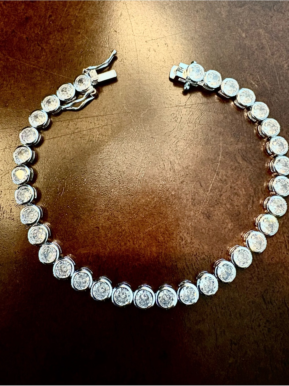 Sterling Tennis Bracelet with round Swarovski Stones is Brand New !
